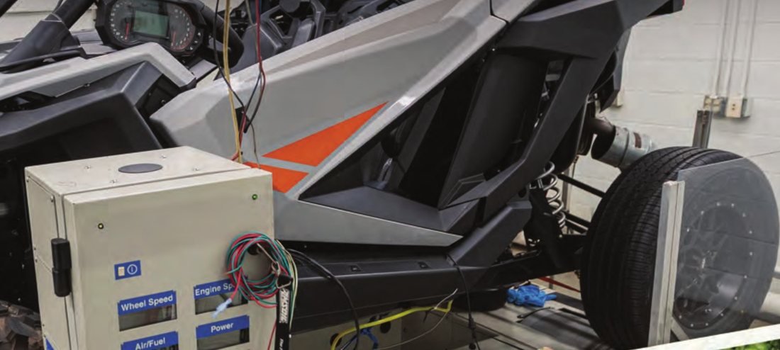 Côte-à-côte instrumenté sur banc d'essai en laboratoire : mesure de vitesse de roue, régime moteur, air/carburant et puissance